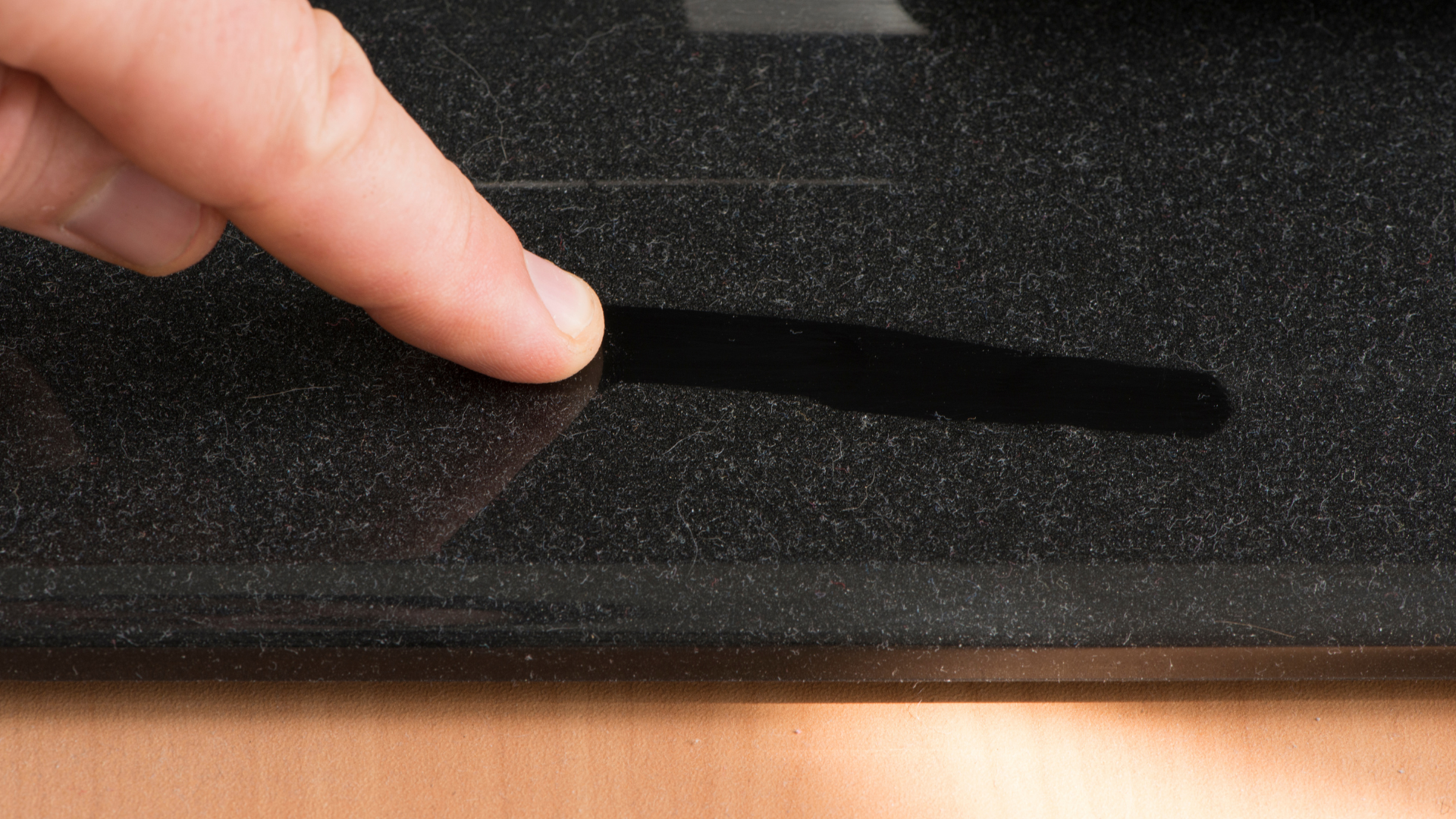 Dust shown on the surface of the kitchen worktop